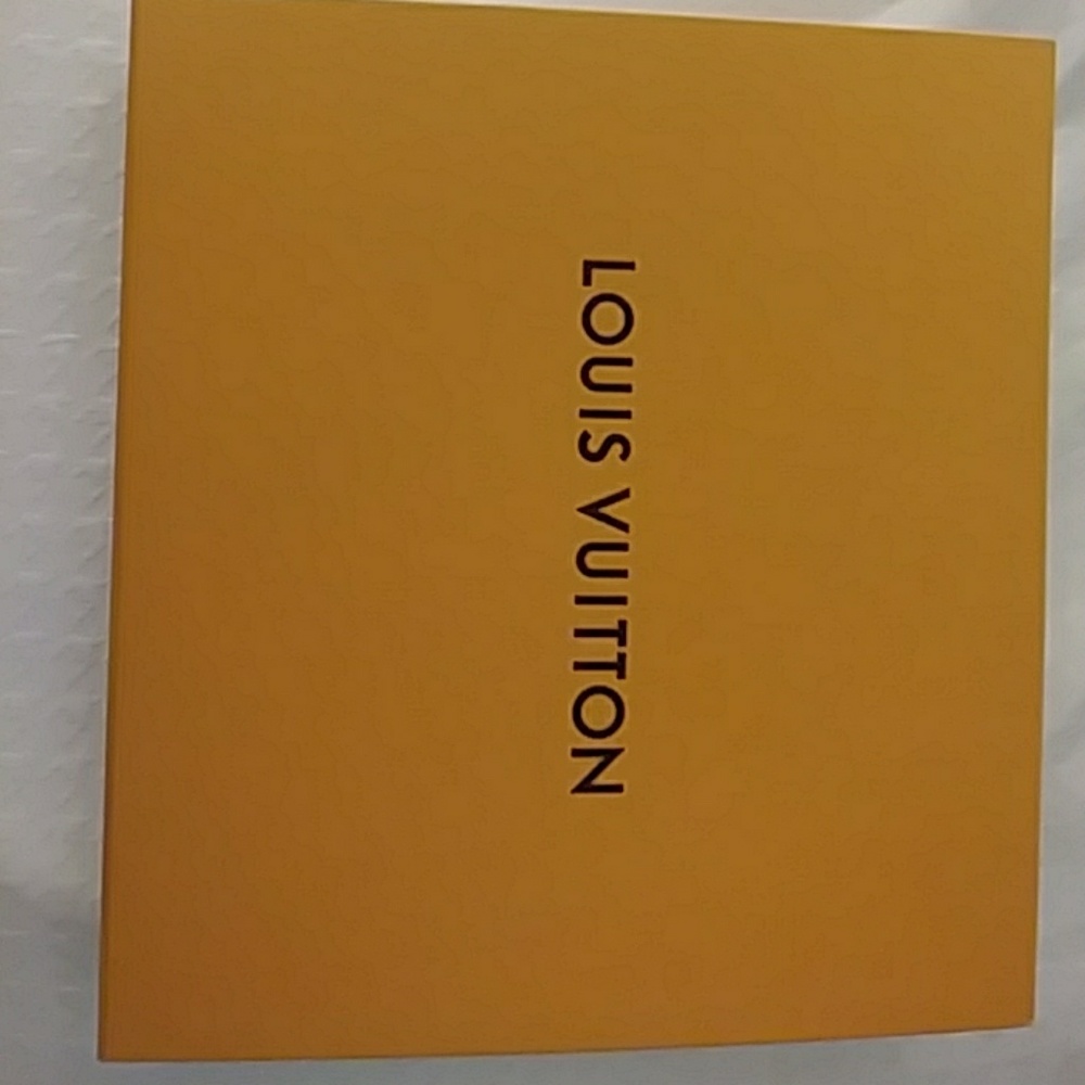 Louis Vuitton box and ribbon